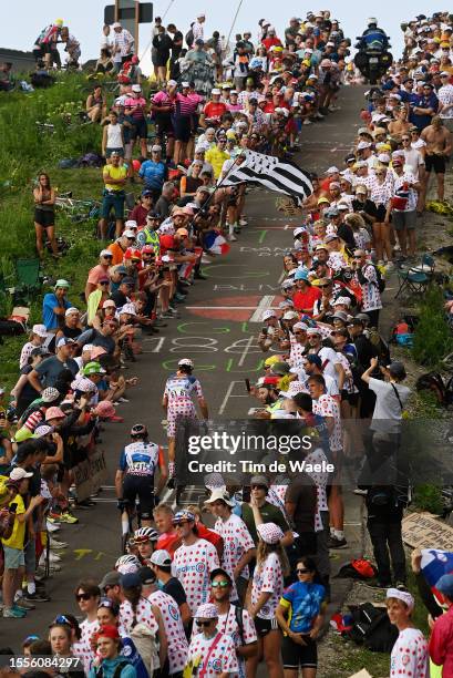 Hugo Houle of Canada and Team Israel-Premier Tech and Giulio Ciccone of Italy and Team Lidl-Trek - Polka Dot Mountain Jersey compete in the chase...