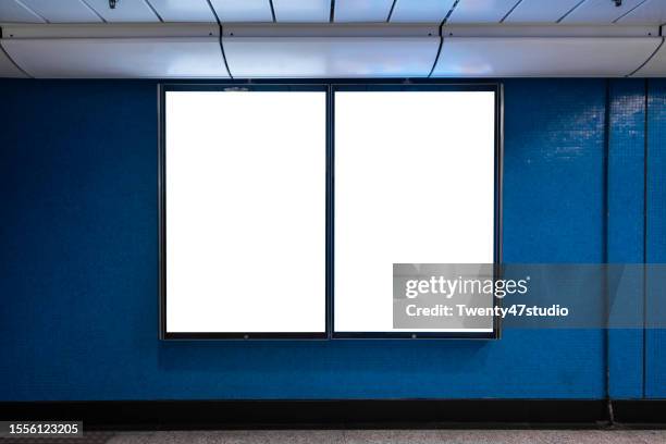 blank advertisement billboard in subway station - treno della metropolitana foto e immagini stock