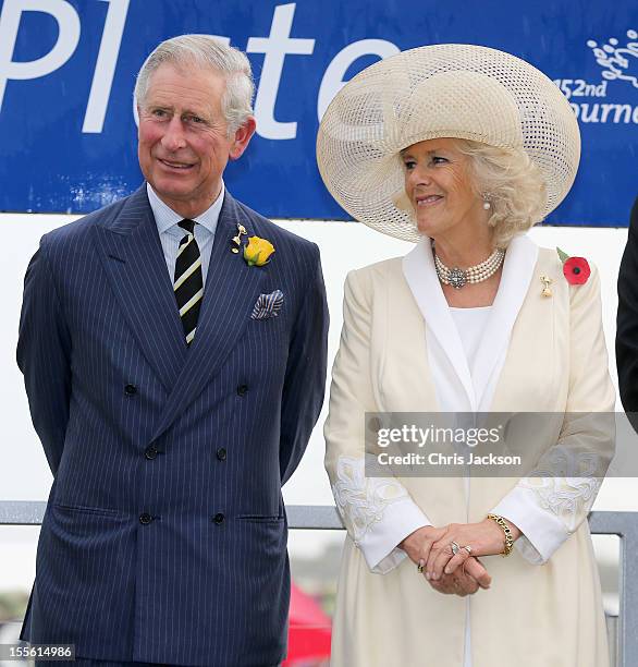 Camilla, Duchess of Cornwall and Prince Charles, Prince of Wales share a joke as they attend the Melbourne Cup on November 6, 2012 in Melbourne,...