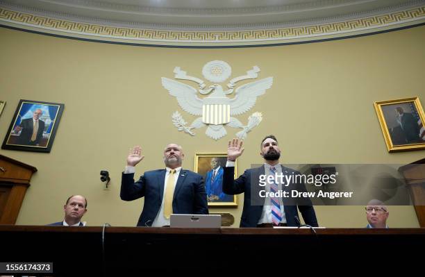 Supervisory IRS Special Agent Gary Shapley and IRS Criminal Investigator Joseph Ziegler are sworn-in as they testify during a House Oversight...