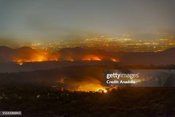 Fire breaks out on Mount Etna and spreads across the entire southern slope of the volcano as wildfires hit Sicily, in Catania, Italy on July 26,...