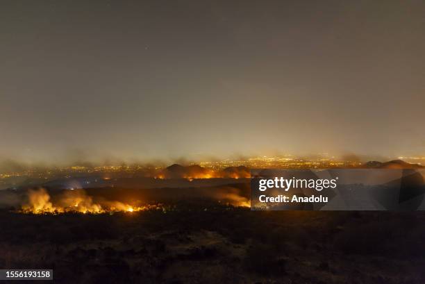 Fire breaks out on Mount Etna and spreads across the entire southern slope of the volcano as wildfires hit Sicily, in Catania, Italy on July 26,...