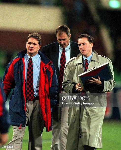 Greg Hutchison, Matt Rendell and Cameron Schwab, of Melbourne walk to the club dressing rooms, during the match between Melbourne and Richmond,...