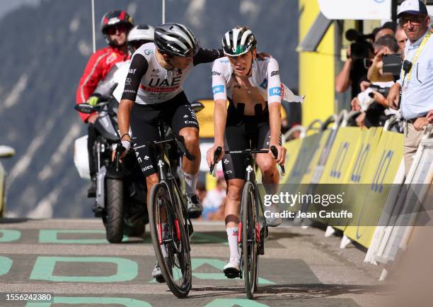 Marc Soler of Spain and UAE Team Emirates consoles teammate White jersey of best young rider Tadej Pogacar of Slovenia and UAE Team Emirates when...