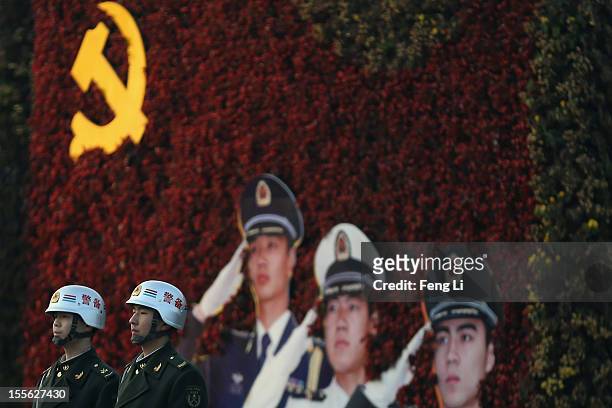 Chinese soldiers stand guard on Chang'an Avenue on November 6, 2012 in Beijing, China. The18th National Congress of the Communist Party of China is...