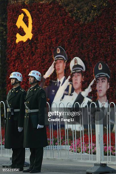 Chinese soldiers stand guard on Chang'an Avenue on November 6, 2012 in Beijing, China. The18th National Congress of the Communist Party of China is...