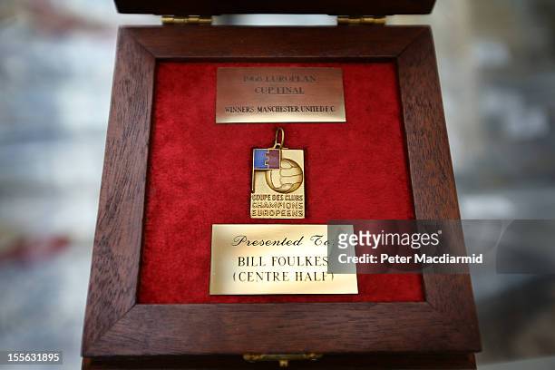 The 1968 European Cup winner's medal awarded to Bill Foulkes of Manchester United is displayed for sale at Sotheby's on November 6, 2012 in London,...