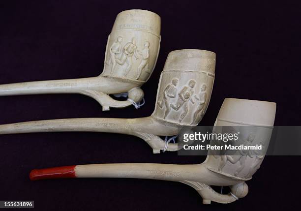 Collection of Victorian smokers pipes decorated with sporting releifs are shown at Sotheby's on November 6, 2012 in London, England. Graham Budd...