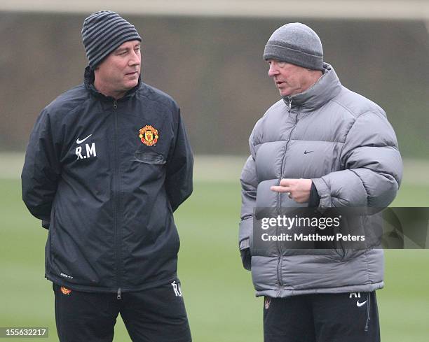 Manager Sir Alex Ferguson of Manchester United speaks to First Team Coach Rene Meulensteen during a first team training session, ahead of their UEFA...