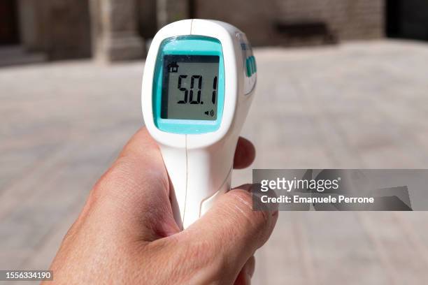 The thermometer sign reads 50.1 degrees celsius on July 19, 2023 in Sassari, Sardinia, Italy. The government has issued red alerts for 16 cities due...