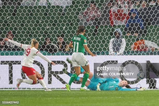 Ireland's goalkeeper Courtney Brosnan fails to stop a ball deflected off Ireland's midfielder Megan Connolly who scores an own goal during the...