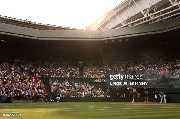 Carlos Alcaraz of Spain in action against Novak Djokovic of Serbia in the Men's Singles Final on day fourteen of The Championships Wimbledon 2023 at...
