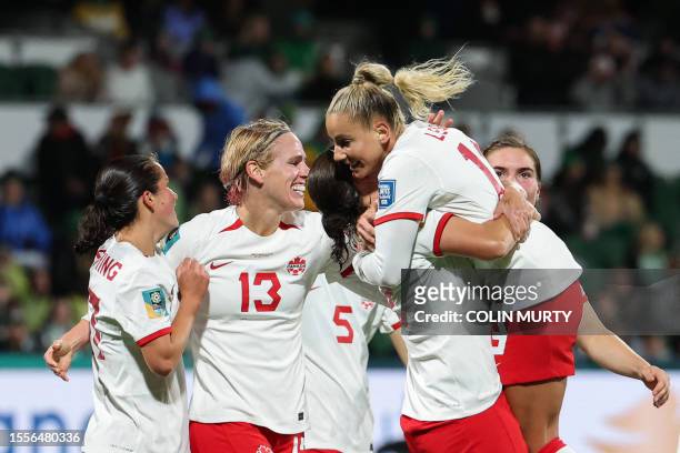 Canada's forward Adriana Leon celebrates with her teammates after scoring her team's second goal during the Australia and New Zealand 2023 Women's...