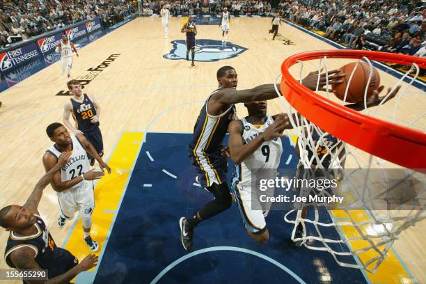 Marvin Williams of the Utah Jazz blocks a shot against Tony Allen of the Memphis Grizzlies on November 5, 2012 at FedExForum in Memphis, Tennessee....