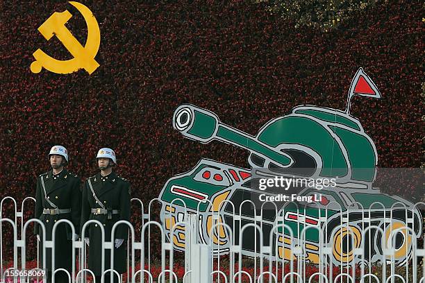 Chinese soldiers stand guard on Chang'an Avenue on November 6, 2012 in Beijing, China. The18th National Congress of the Communist Party of China is...