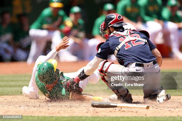 Bleday of the Oakland Athletics is tagged out by Connor Wong of the Boston Red Sox at home plate in the fifth inning at RingCentral Coliseum on July...