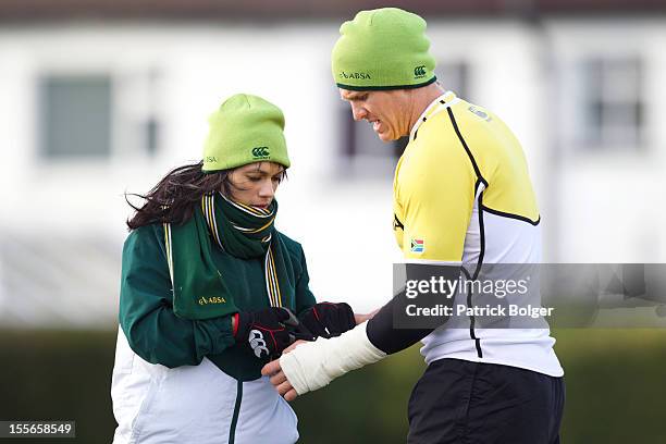 Captain Jean De Villiers and physio Rene Naylor during a South Africa team training session at Blackrock College RFC on November 6, 2012 in Dublin,...
