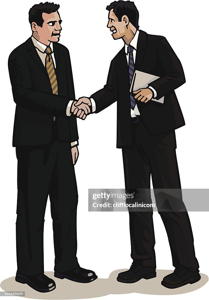 Businessmen shaking hands in agreement