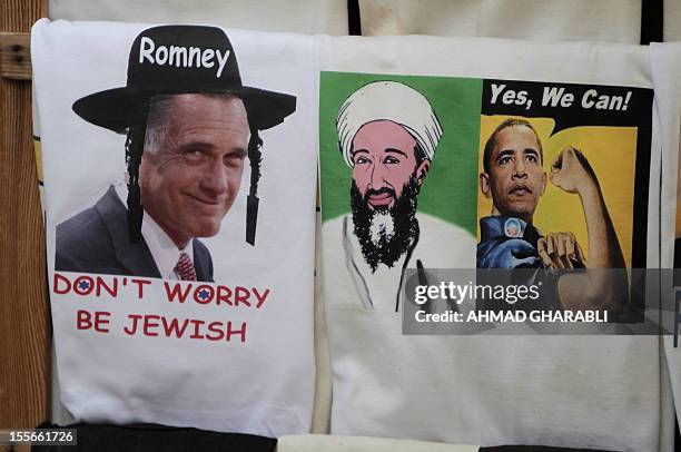 Souvenir shop in Jerusalem's old city displays t-shirts for sale among them one of US Republican presidential candidate Mitt Romney wearing a Jewish...