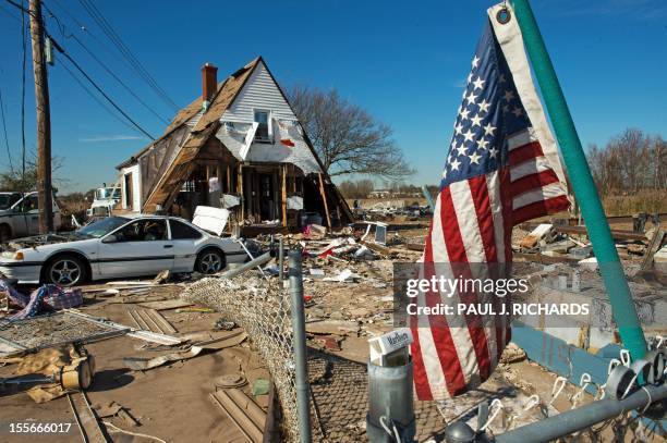 House at 121 Kissam Ave is seen with its entire first floor washed away, as well as the entire surrounding area demolished when Hurricane Sandy hit...