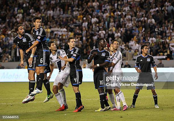 Players from during the San Jose Earthquakes and Los Angeles Galaxy watch the ball go over the net from a Galaxy direct free kick in the second half...