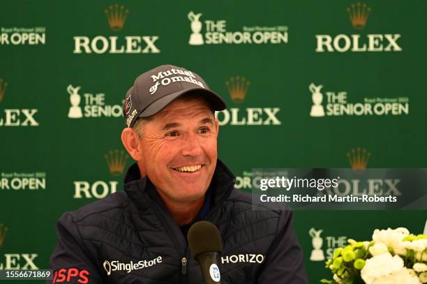 Padraig Harrington of Ireland answers questions from the media at a press conference during a practice round prior to The Senior Open Presented by...