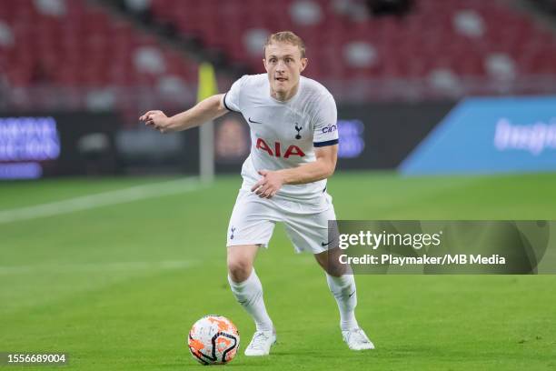 Oliver Skipp of Tottenham Hotspur brings the ball forward during the preseason friendly between Tottenham Hotspur and the Lion City Sailors at the...