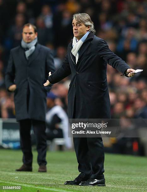 Manchester City Manager Roberto Mancini reacts during the UEFA Champions League Group D match between Manchester City FC and Ajax Amsterdam at the...