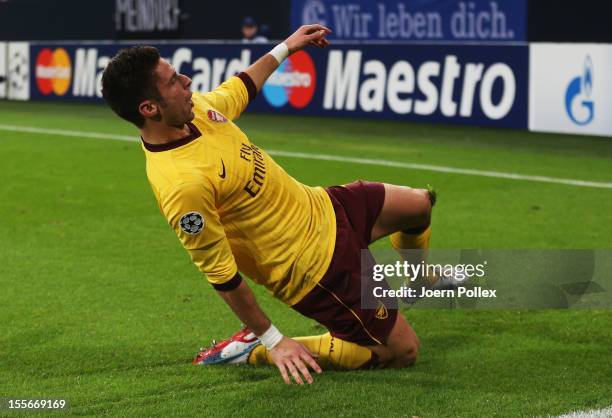 Olivier Giroud of Arsenal celebrates after scoring his team's second goal during the UEFA Champions League group B match between FC Schalke 04 and...