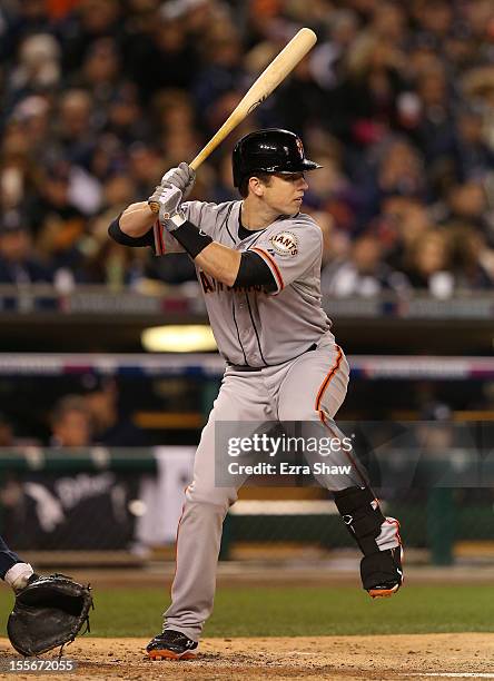 Buster Posey of the San Francisco Giants at bat against the Detroit Tigers during Game Three of the Major League Baseball World Series at Comerica...