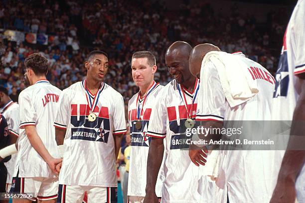 Scottie Pippen, Chris Mullin, Michael Jordan and Charles Barkley laugh following the Gold Medal Basketball game between the United States and Croatia...
