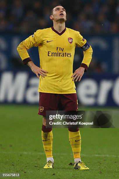 Thomas Vermaelen of Arsenal looks dejected after the 2-2 draw of the UEFA Champions League group B match between FC Schalke 04 and Arsenal FC at...