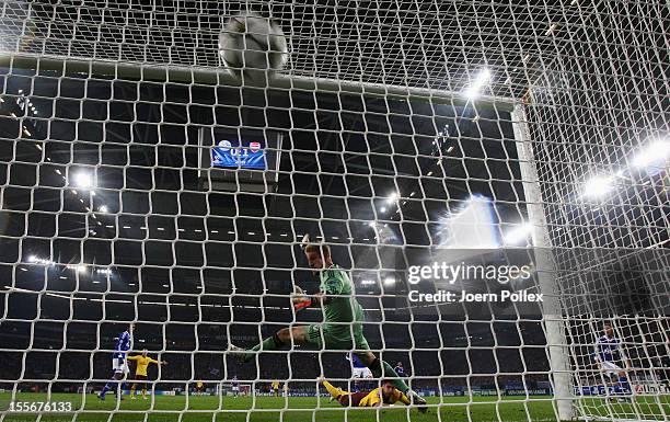 Olivier Giroud of Arsenal scores his team's second goal during the UEFA Champions League group B match between FC Schalke 04 and Arsenal FC at...
