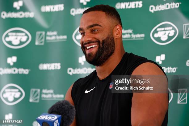 Defensive end Solomon Thomas of the New York Jets talks to reporters after training camp at Atlantic Health Jets Training Center on July 26, 2023 in...