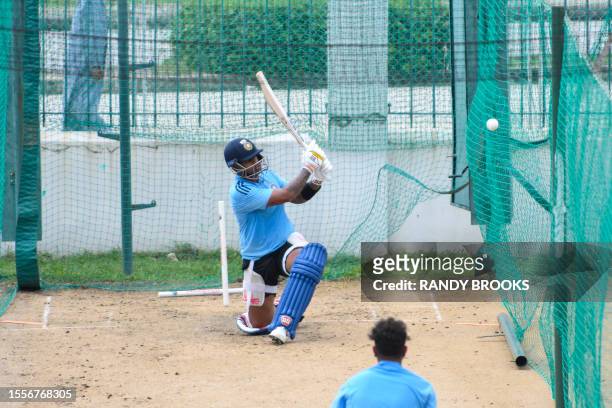 Suryakumar Yadav, of India, takes part in a training session one day before the first One Day International cricket match between West Indies and...