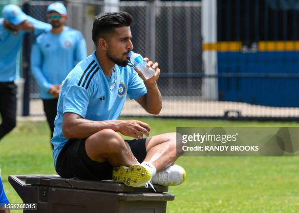 Umran Malik, of India, takes part in a training session one day before the first One Day International cricket match between West Indies and India,...