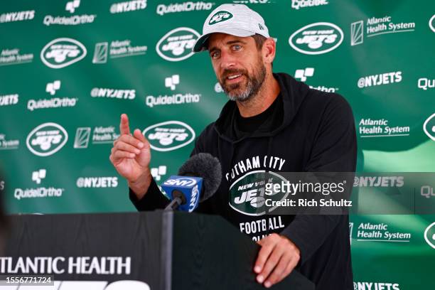 Quarterback Aaron Rodgers of the New York Jets talks to reporters after training camp at Atlantic Health Jets Training Center on July 26, 2023 in...