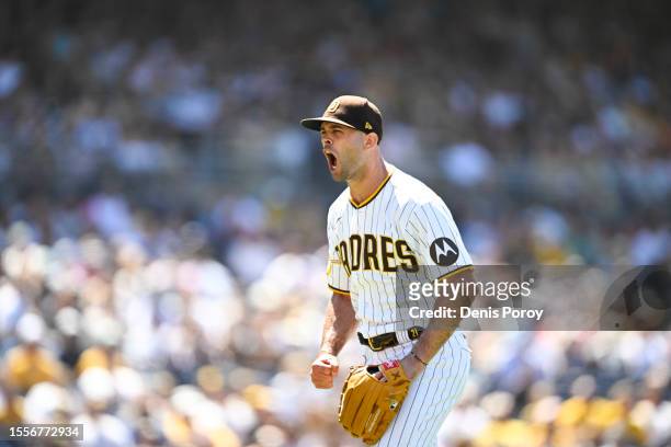 Nick Martinez of the San Diego Padres reacts after pitching during the eighth inning of a baseball game against the Pittsburgh Pirates July 26, 2023...