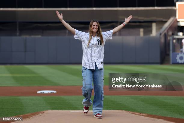 New York Liberty player, Sabrina Ionescu throws the first pitch before the game between the New York Mets and the New York Yankees at Yankee Stadium...