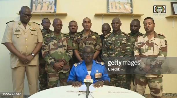 This video frame grab image obtained by AFP from ORTN - Télé Sahel on July 26, 2023 shows Colonel Major Amadou Abdramane , spokesperson for the...