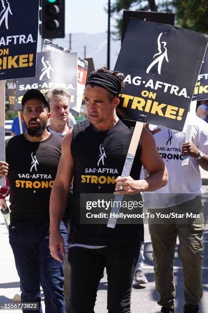 Neil Brown Jr., Shea Whigham and Colin Farrell walk the picket line in support of the SAG-AFTRA and WGA strike on July 26, 2023 in Los Angeles,...