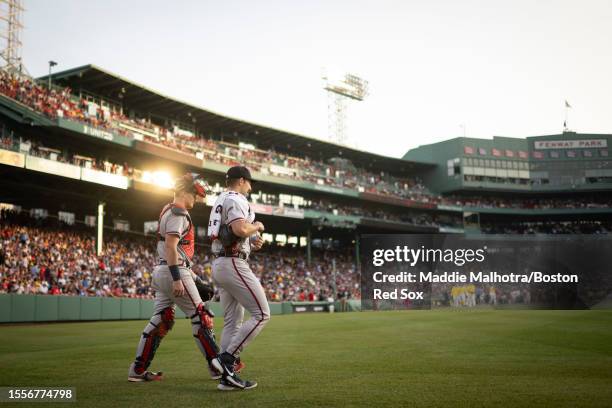 Sean Murphy of the Atlanta Braves and Spencer Strider of the Atlanta Braves walk in from the dugout bullpen before a game against the Boston Red Sox...