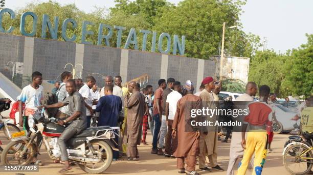 Citizens move on the street with motorcycles as daily life continues in Niamey, Niger on July 26, 2023. Soldiers in Niger appeared on national TV...