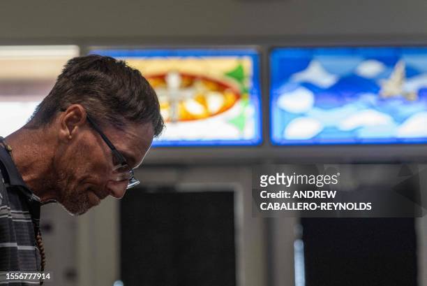 Wayne Pridelson looks on as he rests on a cot at a Salvation Army cooling center in Tucson, Arizona on July 26, 2023. A record-breaking heat wave...