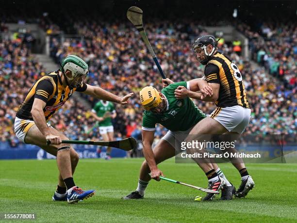 Dublin , Ireland - 23 July 2023; Tom Morrissey of Limerick in action against Conor Fogarty, right, and Paddy Deegan of Kilkenny during the GAA...