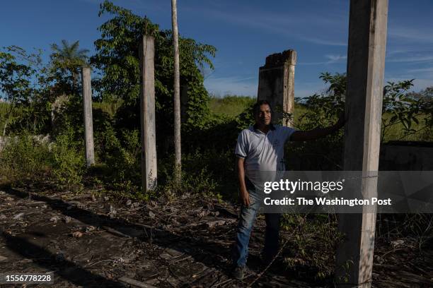 Teacher Luiz Magno Almeida Ribeiro poses for a portrait at an abandoned hospital where his dad worked as a driver. Magno is the principal of the...