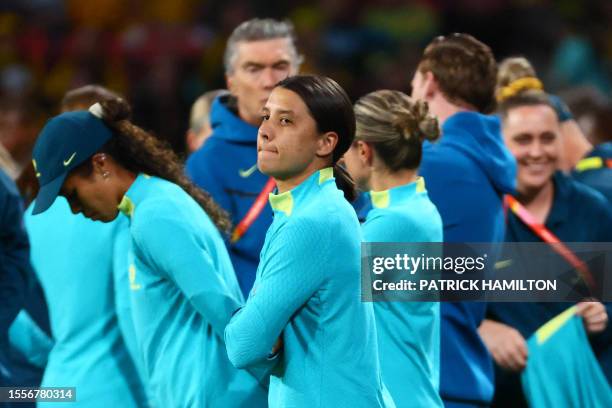 Injuered Australia's captain Sam Kerr is seen on the touchline before the start of the Australia and New Zealand 2023 Women's World Cup Group B...