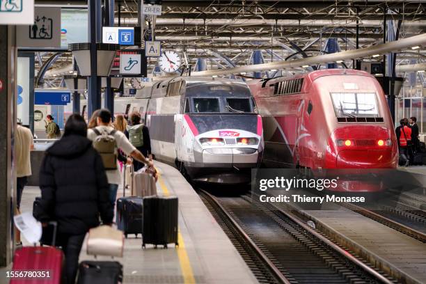 InOui and a Thalys are waiting for passenger Brussels-South railway station on July 25 in Brussels, Belgium. TGV INOUI has gradually replaced...