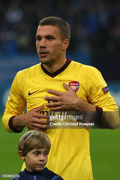 Lukas Podolski of Arsenal looks on prior to the UEFA Champions League group B match between FC Schalke 04 and Arsenal FC at Veltins Arena on November...