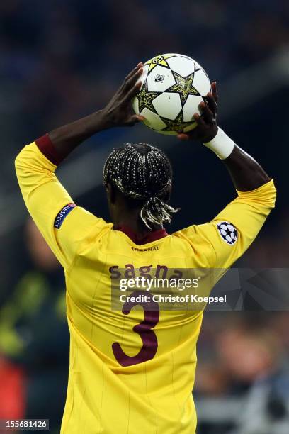 Bacary Sagna of Arsenal does a throw-in during the UEFA Champions League group B match between FC Schalke 04 and Arsenal FC at Veltins Arena on...